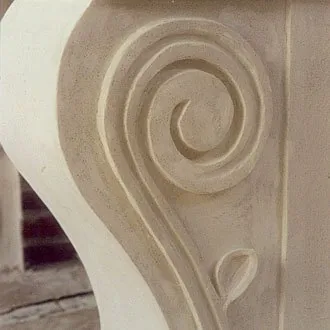 Putsad detalj på murad eldstad